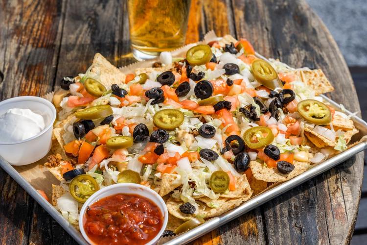 Nachos Recipe - Oven Baked Nachos with Olives, Jalapenos, Salsa and Sour Cream