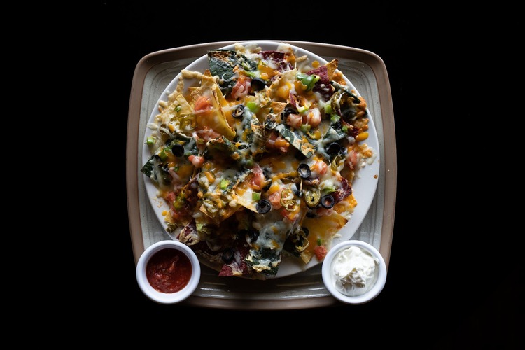 Tortilla Chip Mexican Pizza with Olives, Jalapenos and Cheese - Nachos Recipe