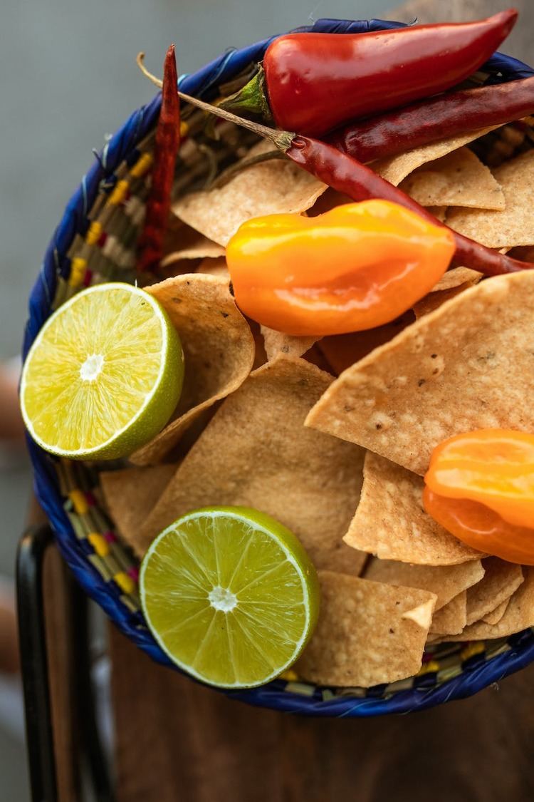 Nachos Recipe - Tortilla Chips Basket with Limes, Red and Yellow Peppers